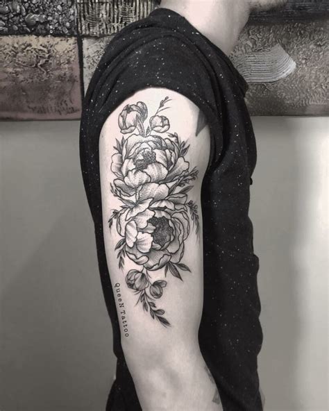 flowers with writing tattoo|flower tattoo ideas for men.